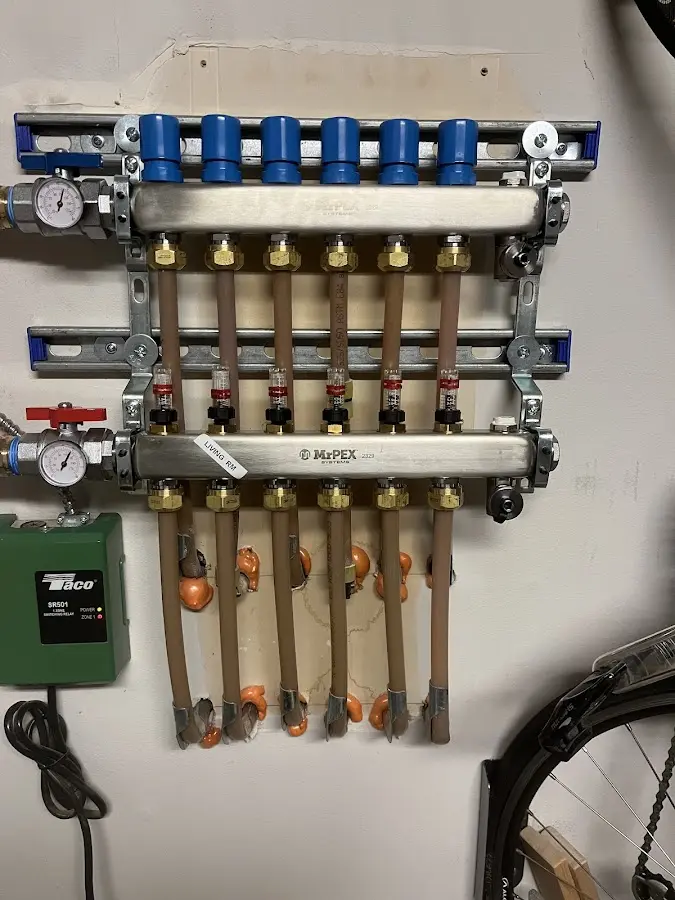 Plumber performing Gas Line Installation at a residential property in Boscobel